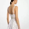Geblümtes Bustier-Oberteil aus Baumwolle mit Ösen Geblümtes Bustier-Oberteil aus Baumwolle mit Ösen