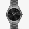 Geschenkset mit übergroßer, schmaler Runway-Armbanduhr aus Gunmetal und Jet-Set-Charm-Lederbrieftasche Geschenkset mit übergroßer, schmaler Runway-Armbanduhr aus Gunmetal und Jet-Set-Charm-Lederbrieftasche