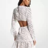 Kleid aus Baumwolle mit Zebra-Ösen und Ausschnitten Kleid aus Baumwolle mit Zebra-Ösen und Ausschnitten