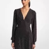 Kleid aus Georgette mit Strasssteinen Kleid aus Georgette mit Strasssteinen