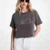 Kurzes T-Shirt aus stückgefärbter Baumwolle mit Nieten Kurzes T-Shirt aus stückgefärbter Baumwolle mit Nieten