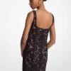 Minikleid aus schnurgebundener Blumenspitze mit Nieten Minikleid aus schnurgebundener Blumenspitze mit Nieten