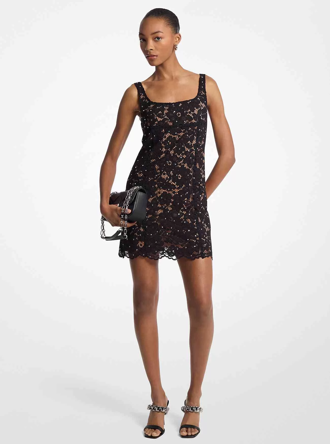 Minikleid aus schnurgebundener Blumenspitze mit Nieten