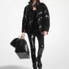 Steppjacke mit Pailletten und Ciré-Steppung Steppjacke mit Pailletten und Ciré-Steppung