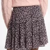 Stufenrock aus Georgette mit Nieten und Blumenmuster Stufenrock aus Georgette mit Nieten und Blumenmuster