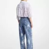 Von Hand bespritzte Jeans mit weitem Bein aus gebleichtem Denim Von Hand bespritzte Jeans mit weitem Bein aus gebleichtem Denim